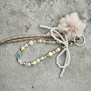 Elegant Beaded Keychain with Pom Pom